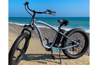 black electric bike on the beach